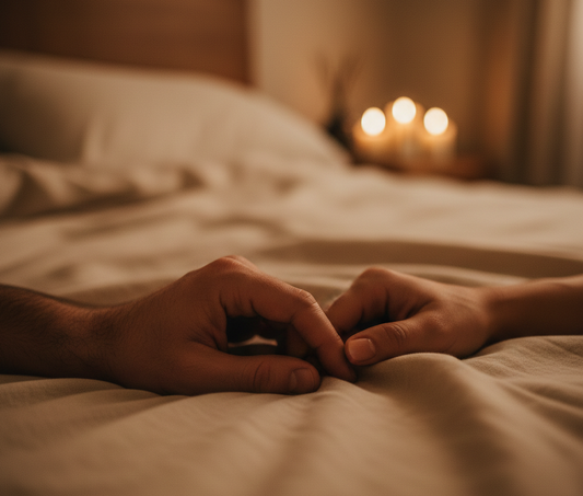 Soft focus of a woman's hand on a man's back