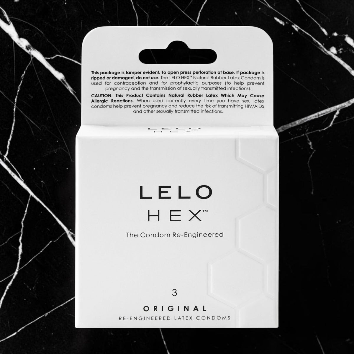 LELO HEX Original Re-Engineered Latex Condoms packaging box, containing 3 condoms, shown on a black marble background.