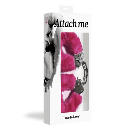 Product packaging with 'Attach me' text and a pink and black design.