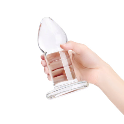 Dilatador anal de vidrio borosilicato transparente de PlayLoveToys para entrenamiento progresivo y temperatura.