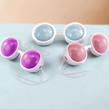 Set de bolas de Kegel LELO Beads Plus de PlayLoveToys con esferas de silicona intercambiables en tonos rosa y morado