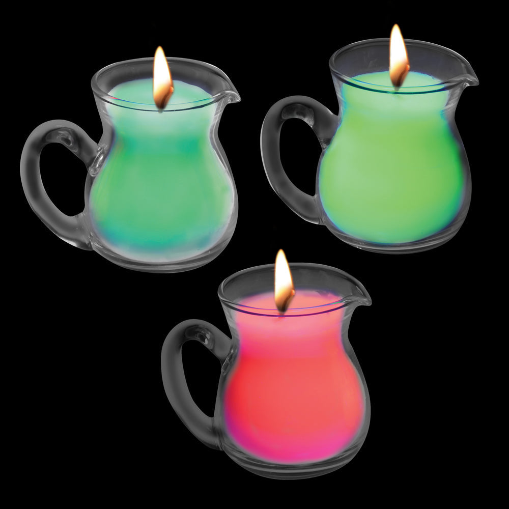 Set de 3 velas de cera reactivas a luz negra Master Series de PlayLoveToys en colores neón rojo, verde y amarillo.