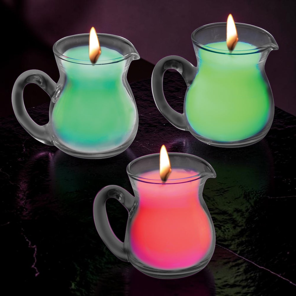 Set de 3 velas de cera reactivas a luz negra Master Series de PlayLoveToys en colores neón rojo, verde y amarillo.